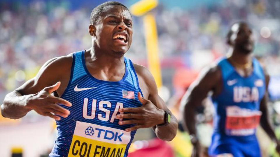 Coleman wins 100m gold at the World Championships who was freed to race after missed tests charges are dropped